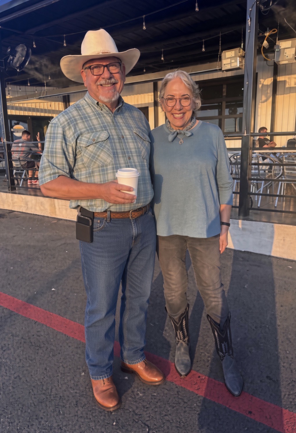 Cindy Slimak with her husband outdoors